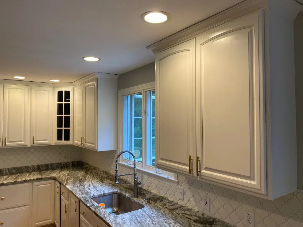 Cabinet makeover in a stunning hue by Gölsmith Painting Company - Photo 2