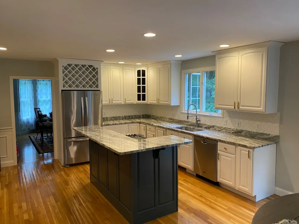 Cabinet makeover in a stunning hue by Gölsmith Painting Company - Photo 4