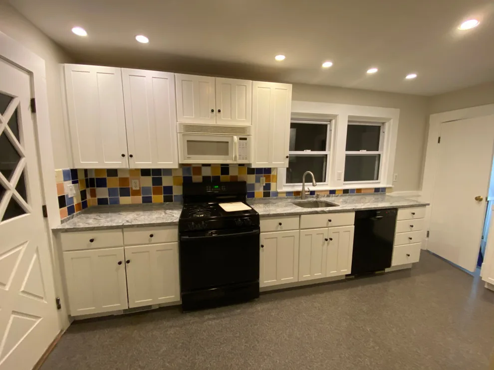 Cabinet restoration and new countertops by Powell Painting And Home Services - Photo 3