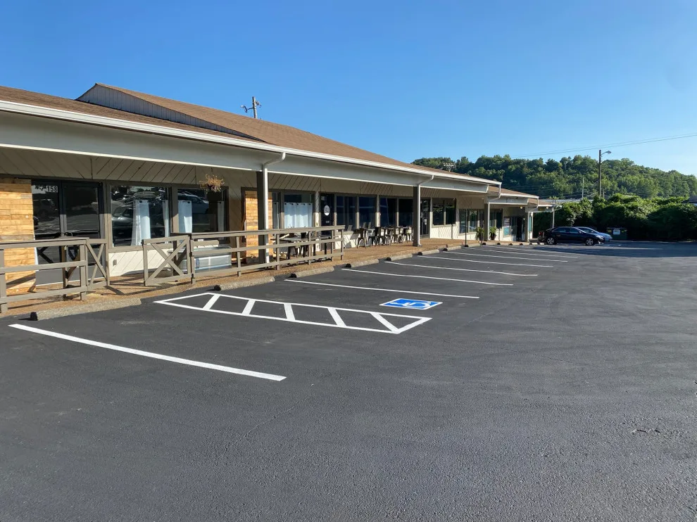 Pavement sealing and marking for parking lots by Precision Painting - Photo 3