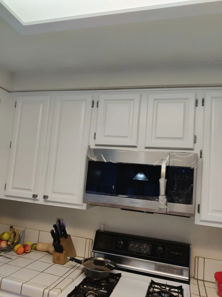 Refinished Kitchen Cabinets by Antonio's Painting Services - Photo 13