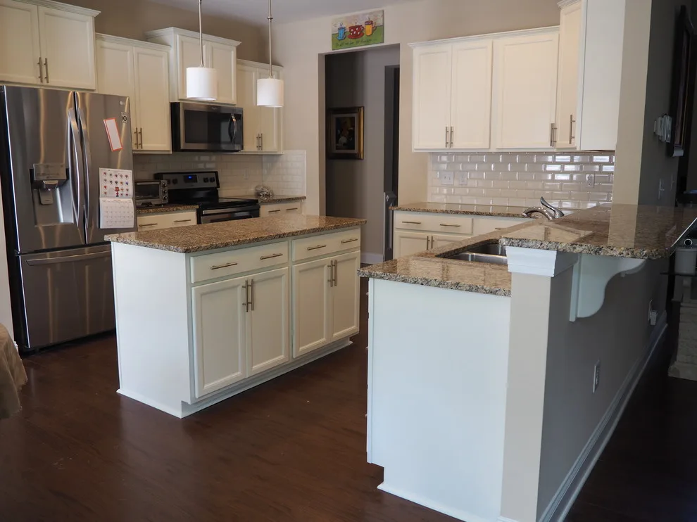 Pure White Painted Cherry Cabinets by Wallscapers Kitchen & Bath Innovations - Photo 2