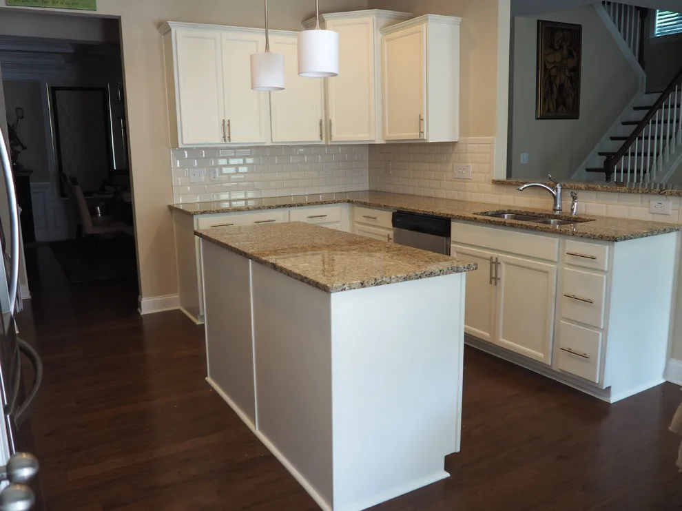 Pure White Painted Cherry Cabinets by Wallscapers Kitchen & Bath Innovations - Photo 4