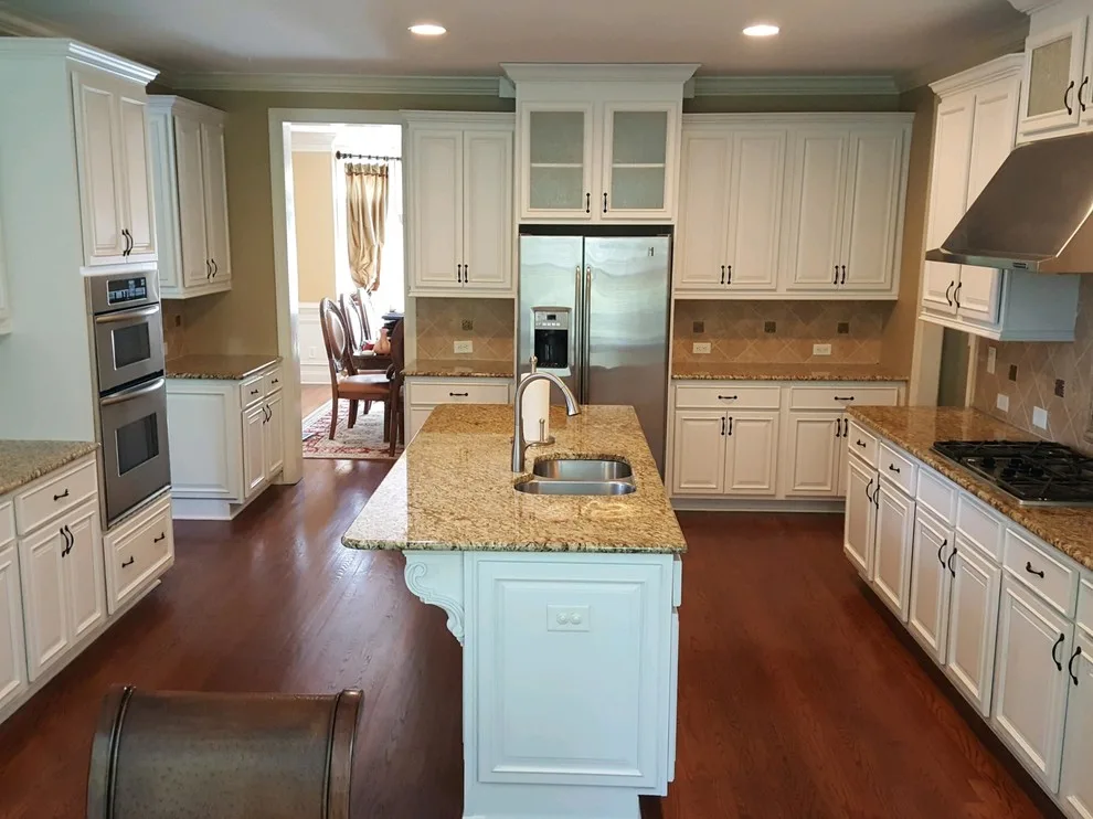 Expansive Kitchen in White Paint by Wallscapers Kitchen & Bath Innovations - Photo 2