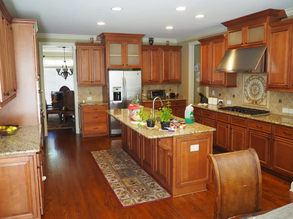 Expansive Kitchen in White Paint by Wallscapers Kitchen & Bath Innovations - Photo 3