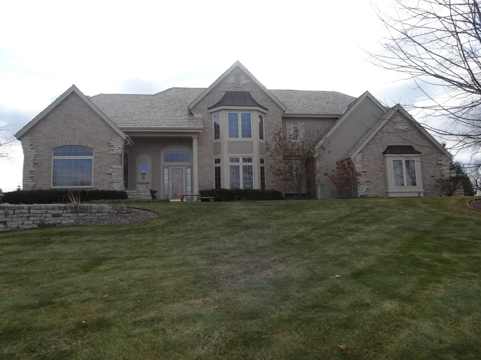 Tan and Red Trimmed Brick Houses by Two Day Painting LLC - Photo 2