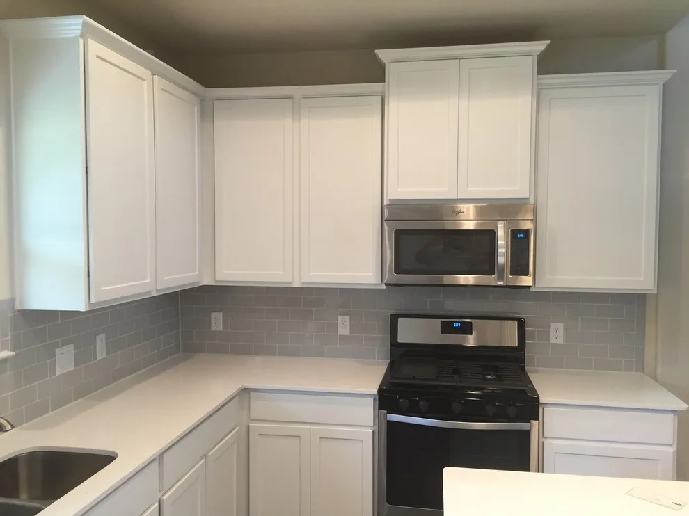Luminous White Kitchen Cabinets by Austin's Paint Guys - Photo 11