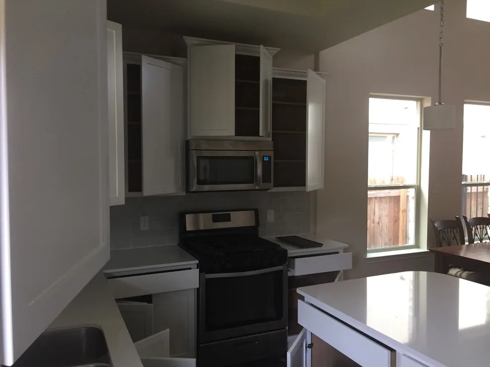 Luminous White Kitchen Cabinets by Austin's Paint Guys - Photo 10