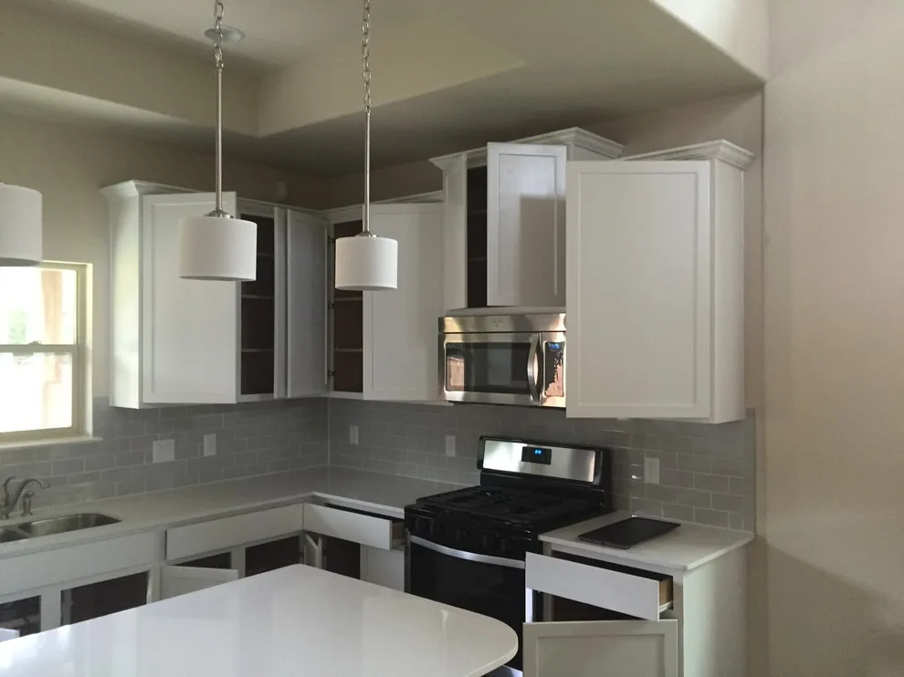 Luminous White Kitchen Cabinets by Austin's Paint Guys - Photo 6