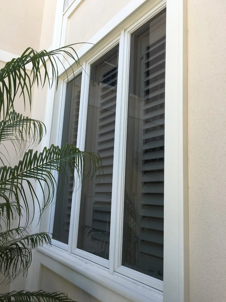 Exterior Custom Doors and Window Trim by Sarasota Painting & Wall Covering - Photo 11