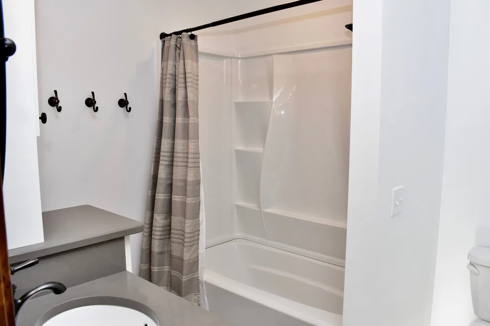 Light-Colored Restroom by EdgeWork Design Build - Photo 15