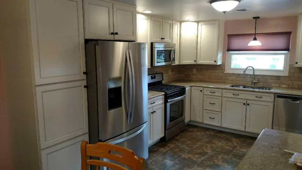 White Kitchen Cabinet by Johnston Remodeling - Photo 2