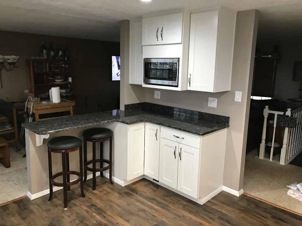 White Kitchen Cabinet by Johnston Remodeling - Photo 4