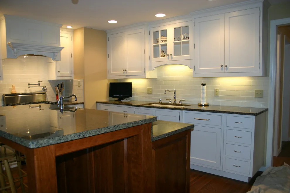 Two-Tier Island in a White Kitchen by Zalewski Associates Inc. - Photo 3