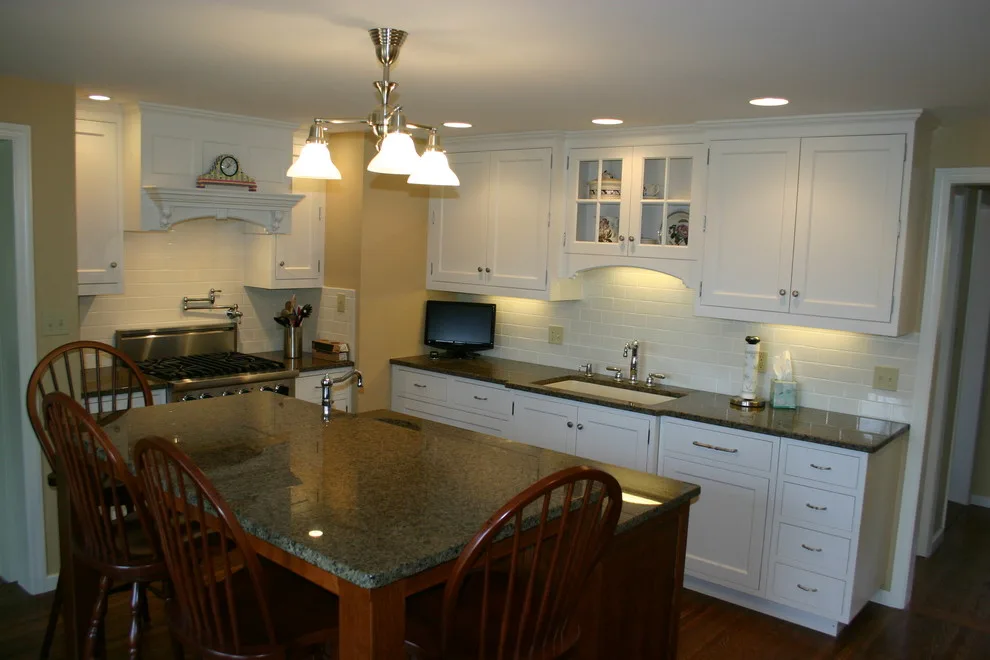 Two-Tier Island in a White Kitchen by Zalewski Associates Inc. - Photo 4