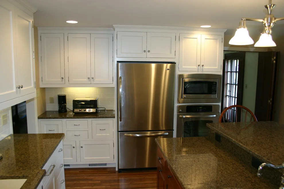 Two-Tier Island in a White Kitchen by Zalewski Associates Inc. - Photo 2