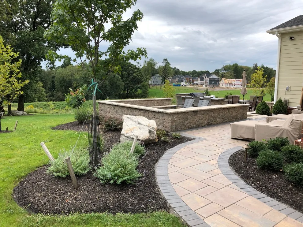 Outdoor Living Space with Fire Pit and Kitchen by Blue Fox Landscape Design Inc - Photo 5