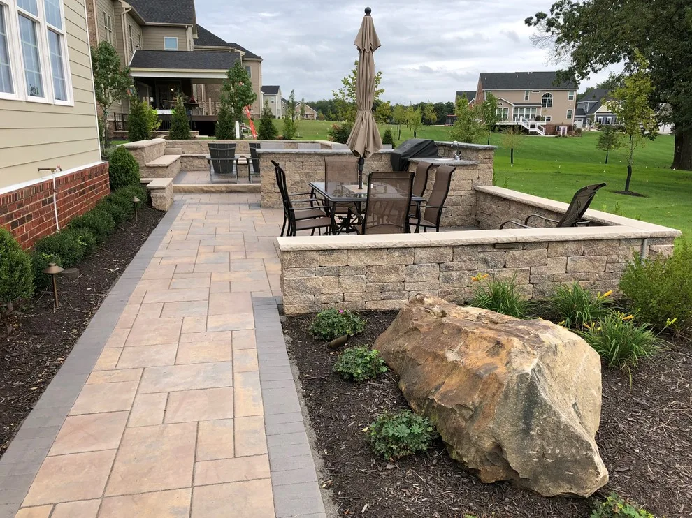 Outdoor Living Space with Fire Pit and Kitchen by Blue Fox Landscape Design Inc - Photo 7