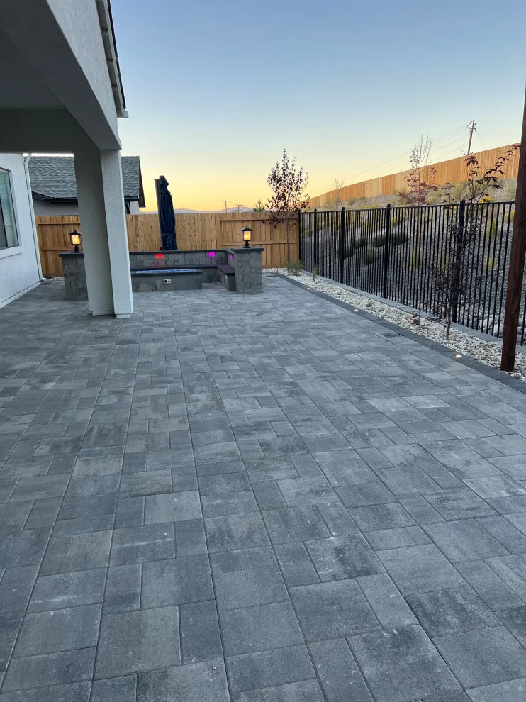 Outdoor space featuring a gas fire pit by Jefe's Landscaping - Photo 7