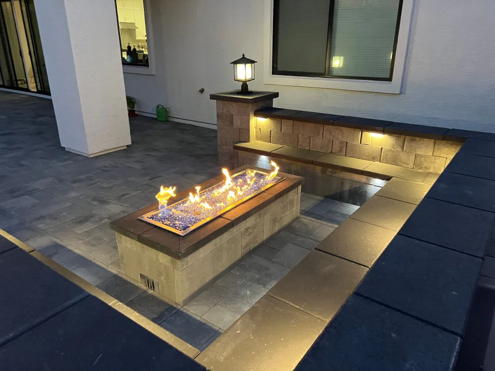 Outdoor space featuring a gas fire pit by Jefe's Landscaping - Photo 4