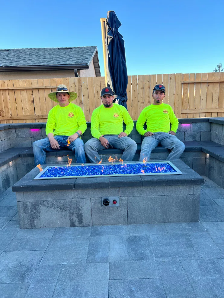 Outdoor space featuring a gas fire pit by Jefe's Landscaping - Photo 6