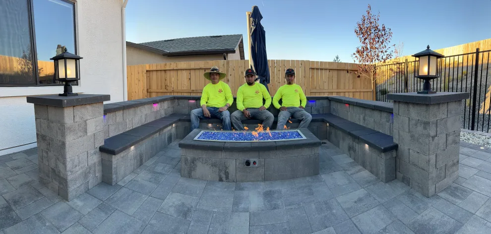 Outdoor space featuring a gas fire pit by Jefe's Landscaping - Photo 5