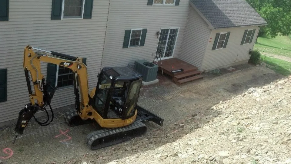 Extensive Retaining Wall and Outdoor Space Renovation by Shaylor's Ponds & Patios - Photo 14