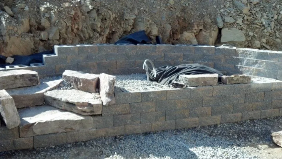Extensive Retaining Wall and Outdoor Space Renovation by Shaylor's Ponds & Patios - Photo 3