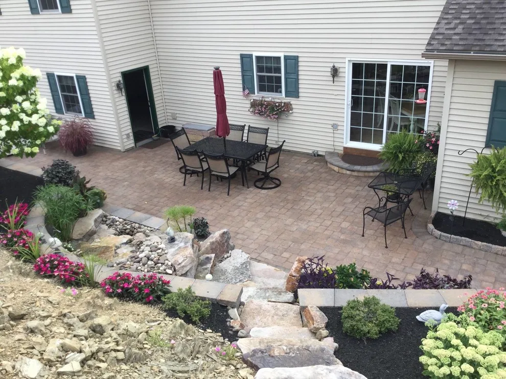 Extensive Retaining Wall and Outdoor Space Renovation by Shaylor's Ponds & Patios - Photo 12