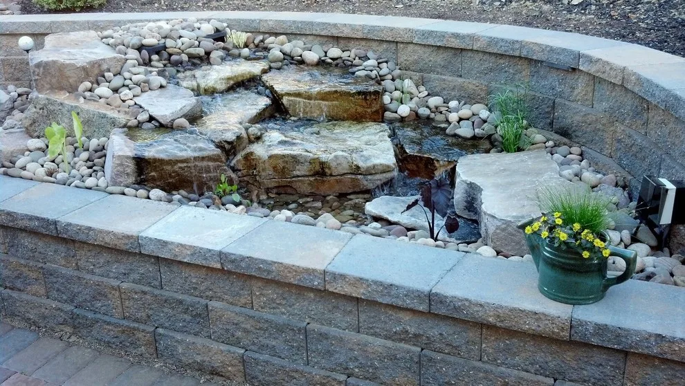Extensive Retaining Wall and Outdoor Space Renovation by Shaylor's Ponds & Patios - Photo 8