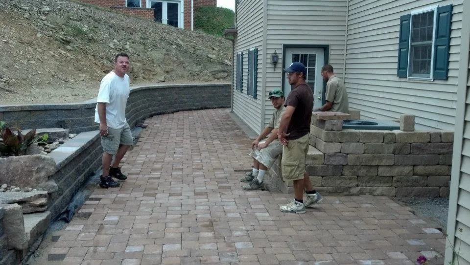 Extensive Retaining Wall and Outdoor Space Renovation by Shaylor's Ponds & Patios - Photo 4