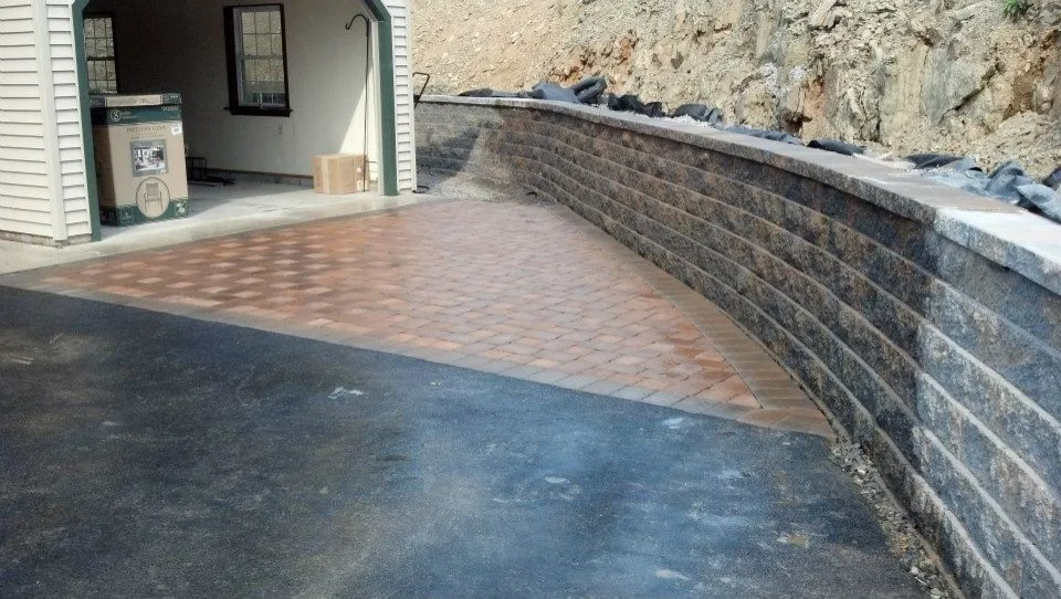 Extensive Retaining Wall and Outdoor Space Renovation by Shaylor's Ponds & Patios - Photo 5