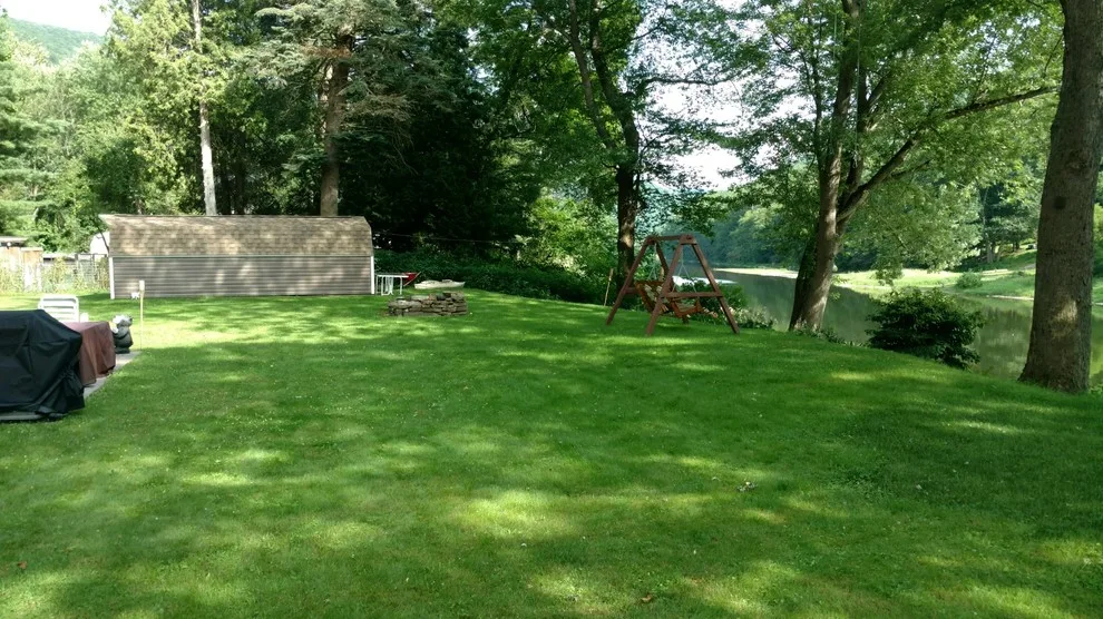 Timberframe Pavilion with Built-in Fireplace and Patio Firepit by Shaylor's Ponds & Patios - Photo 11