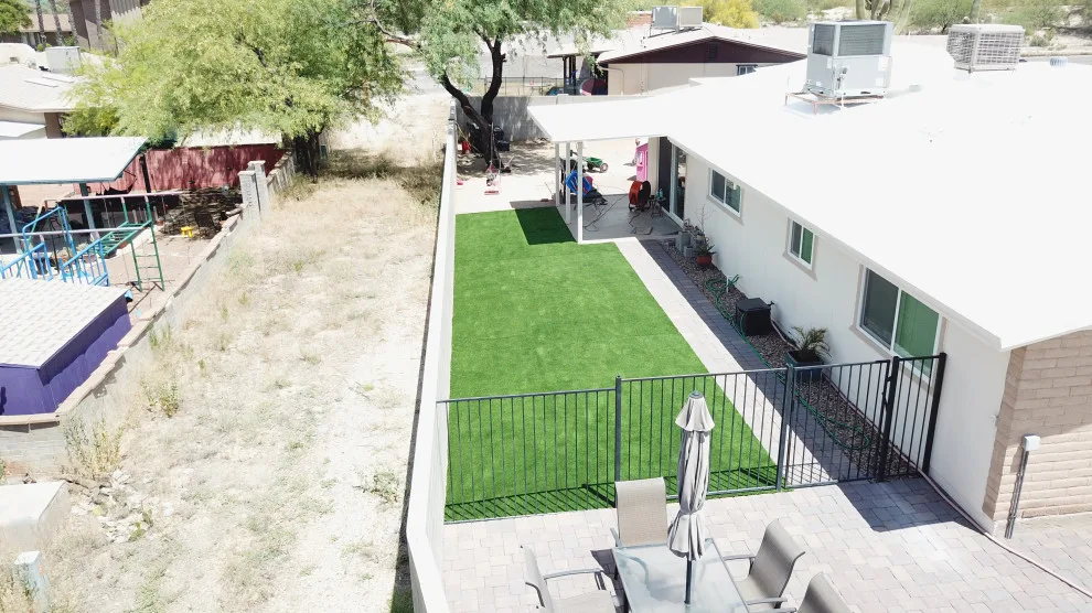 Synthetic turf and paving stones by AZ Custom Landscaping - Photo 2