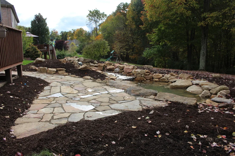 Flagstone Paver Water Garden in the Backyard by Wichman Landscape & Construction - Photo 4