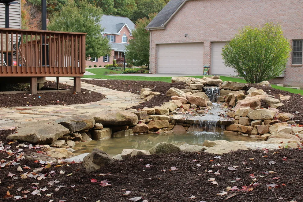 Flagstone Paver Water Garden in the Backyard by Wichman Landscape & Construction - Photo 5