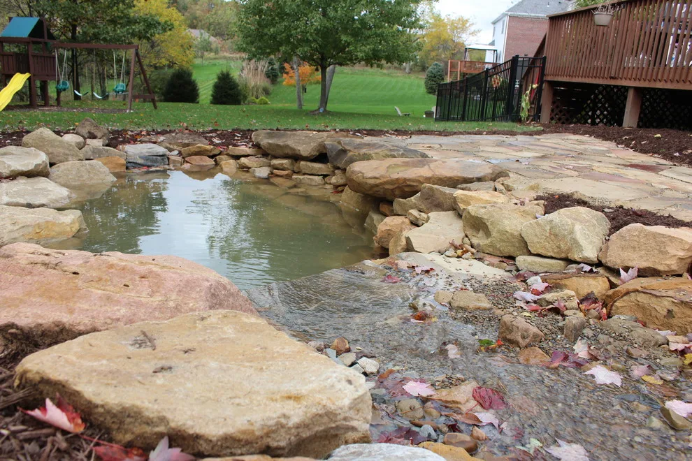 Flagstone Paver Water Garden in the Backyard by Wichman Landscape & Construction - Photo 3