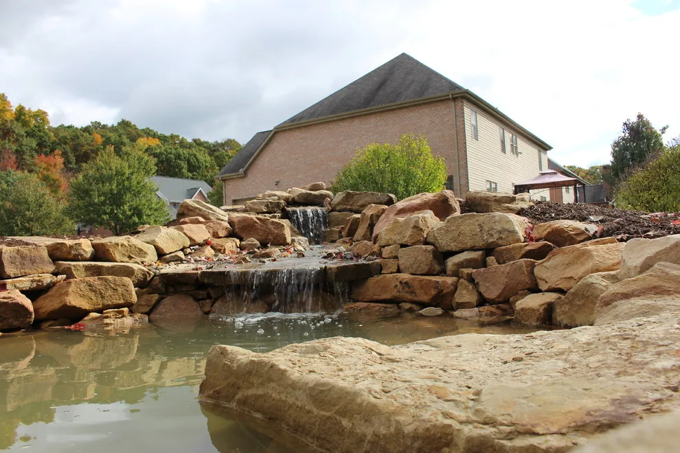 Flagstone Paver Water Garden in the Backyard by Wichman Landscape & Construction - Photo 2