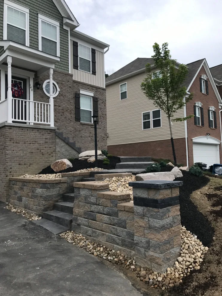 Stunning Stamped Concrete and Retaining Wall Transformation by Schellhaas Landscape Construction - Photo 5