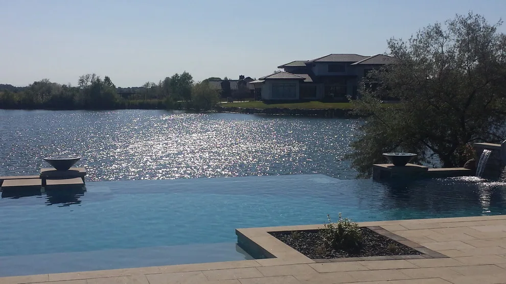 Modern Lakeside Residence by Kimberly Nurseries Landscaping & Irrigation - Photo 11