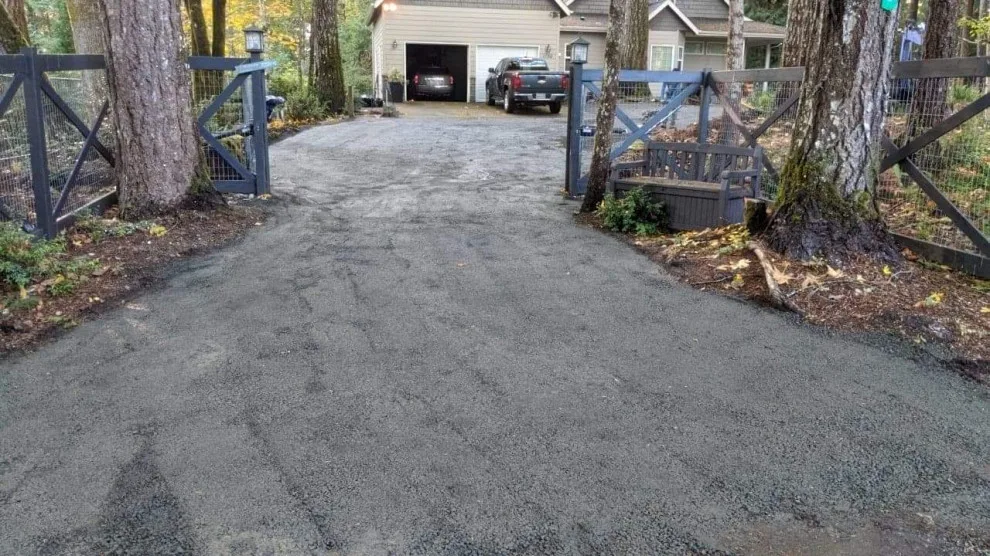 Driveway Installation and Compaction by All Seasons Landscaping Of Mason County LLC - Photo 2
