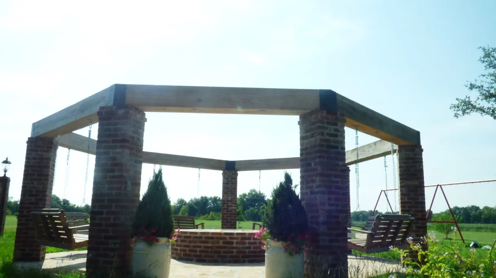 Fire Pit and Swing Outdoor Living Area by Lollys Gardening - Photo 3