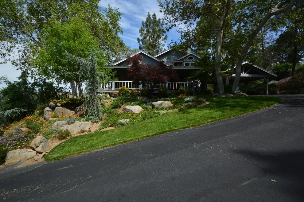 Hillside Property by Kaylor Landscape + Christmas Decor - Photo 3