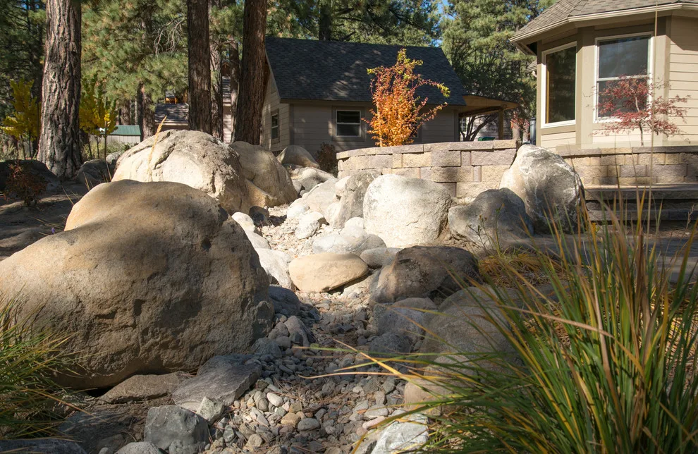 Backyard Renovation for a Forest Home by Gail Willey Landscaping & Colorock - Photo 19