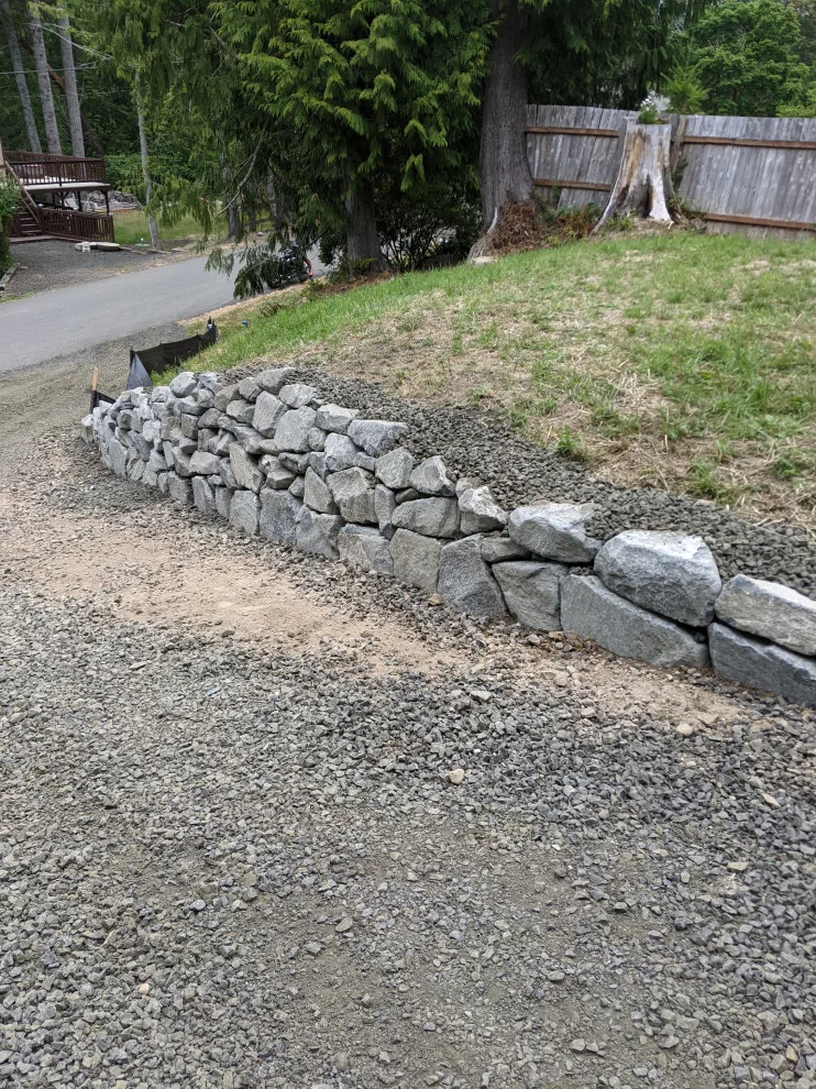 Granite Stone Retaining Walls by All Seasons Landscaping Of Mason County LLC - Photo 4
