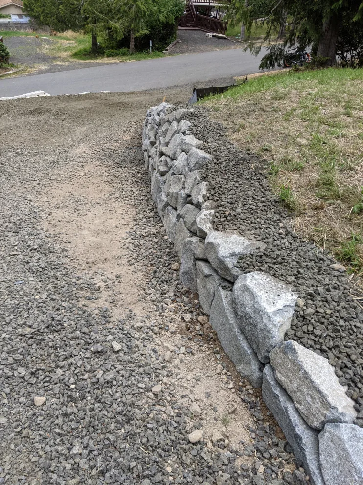 Granite Stone Retaining Walls by All Seasons Landscaping Of Mason County LLC - Photo 5