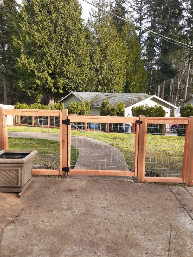 Hog Wire Fencing Panels, Caps, and Custom Gates by All Seasons Landscaping Of Mason County LLC - Photo 7