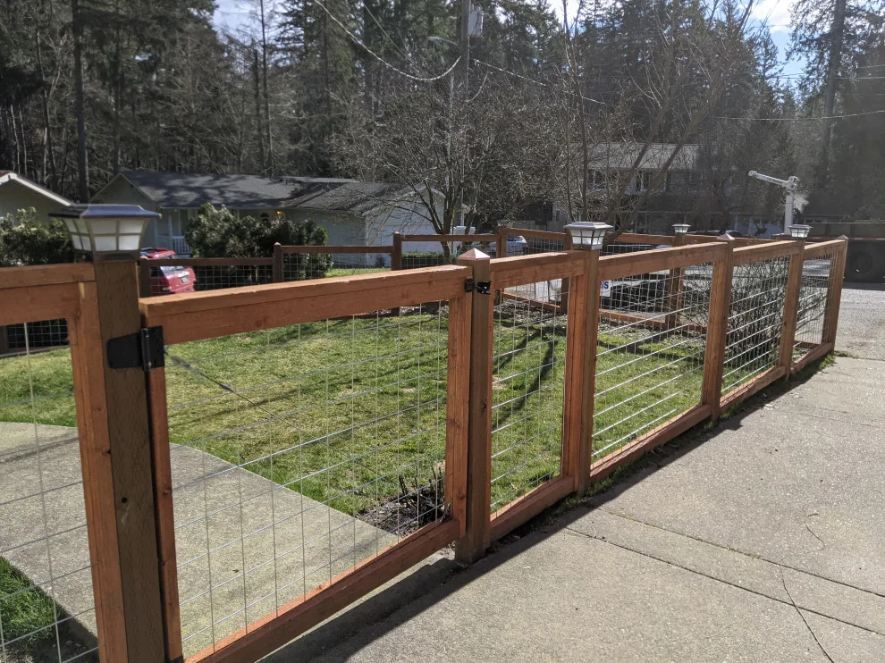 Hog Wire Fencing Panels, Caps, and Custom Gates by All Seasons Landscaping Of Mason County LLC - Photo 10
