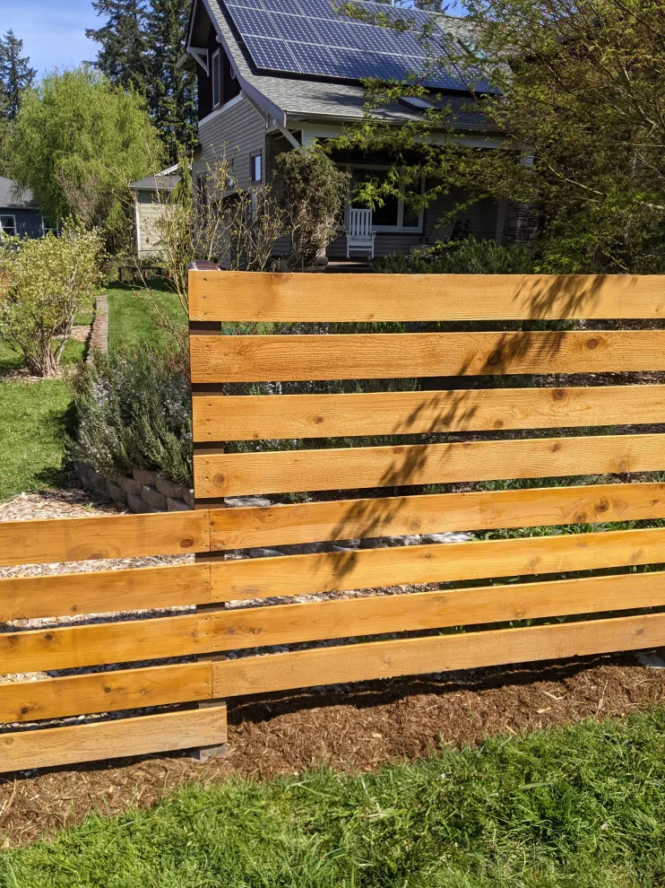 Cedar Fence in a Horizontal Design by All Seasons Landscaping Of Mason County LLC - Photo 3