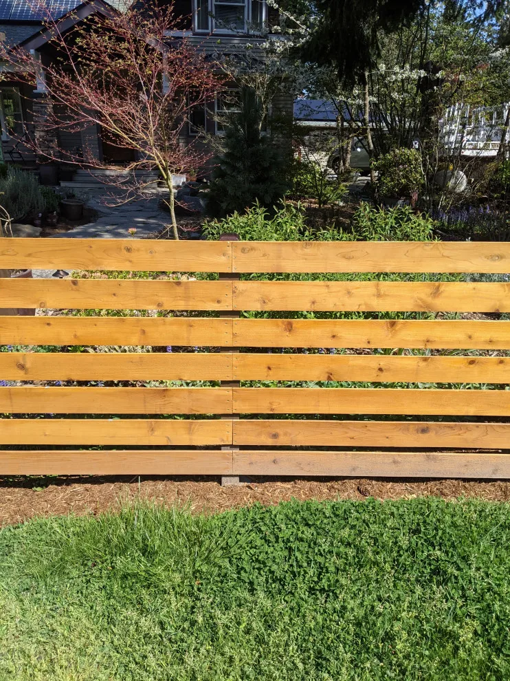 Cedar Fence in a Horizontal Design by All Seasons Landscaping Of Mason County LLC - Photo 2